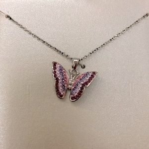 Butterfly pendant in purple and pink crystals silver tone setting and chain 9.5”